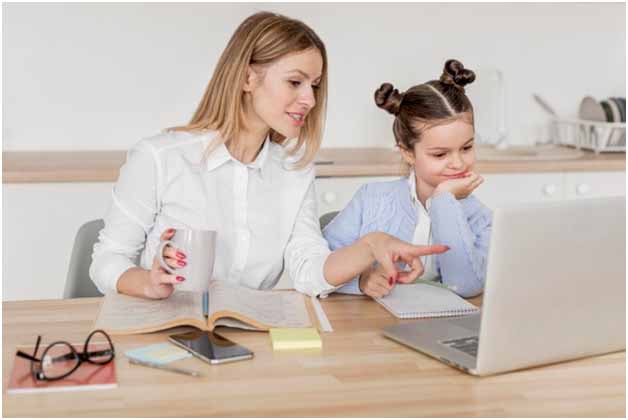 a parent analysing an online school’s curriculum with her child
